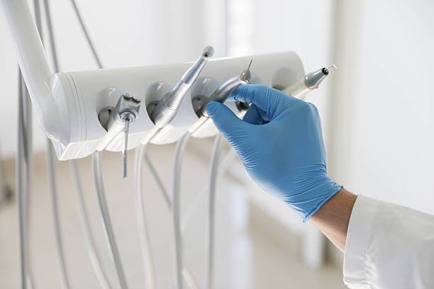 Professional Tooth Extraction technician working in Johnson County County, AR